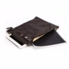 A tablet and a book are sitting on the table.