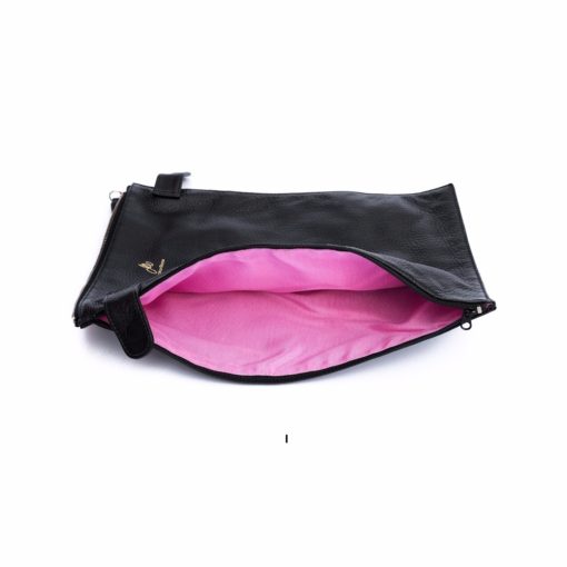 A black bag with pink lining and a handle.