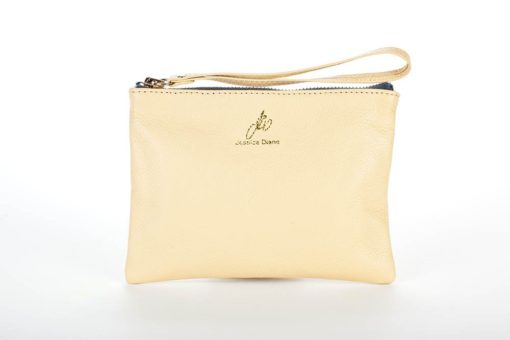 A yellow leather purse with a wrist strap.