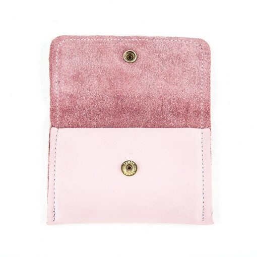 A pink wallet is open and has two small compartments.