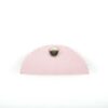 A pink purse with a silver clasp on top of it.